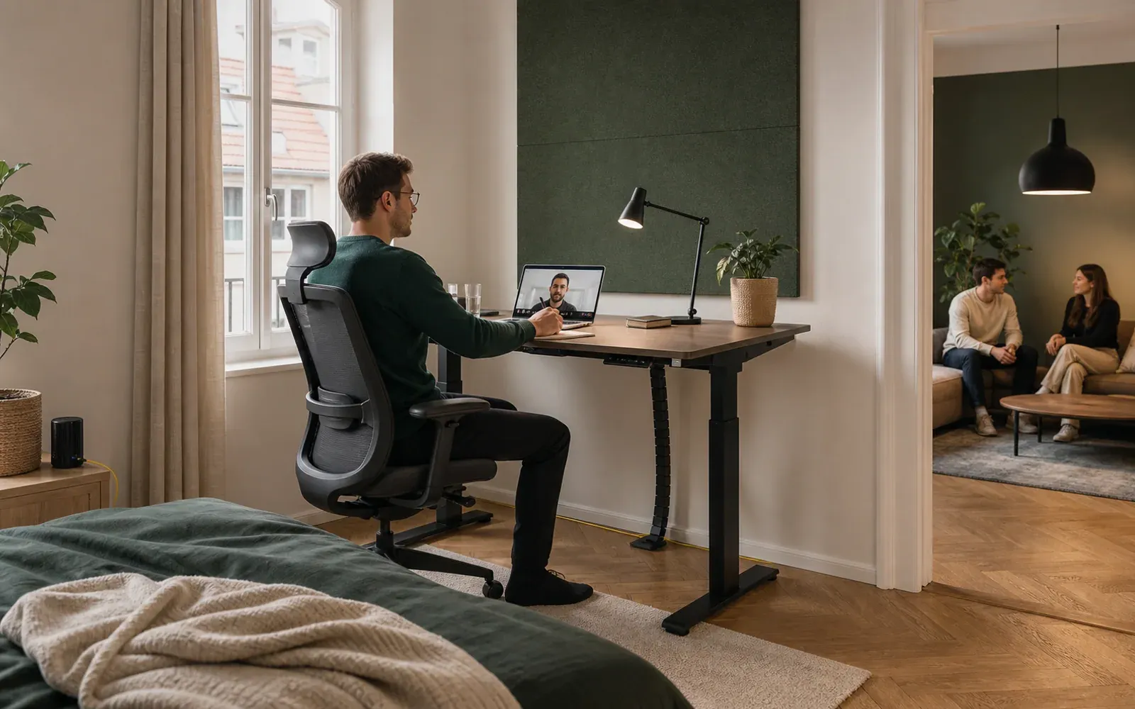 Private room with a height-adjustable desk, ergonomic chair, and quiet remote-work setup