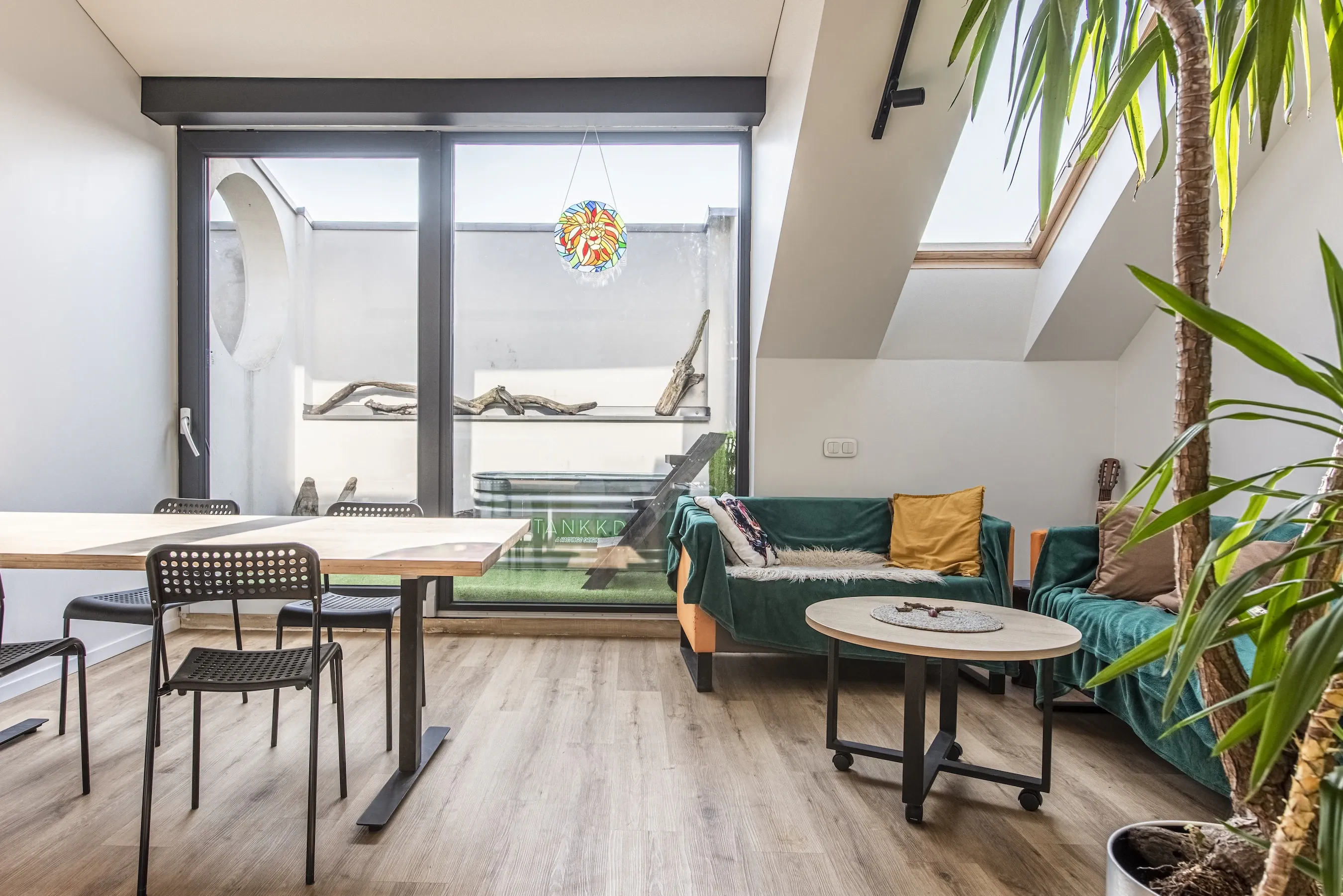 Bright Sparta coHome lounge for shared work and relaxation in Kaunas
